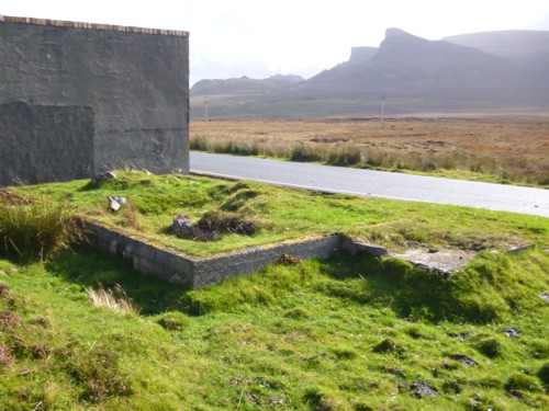 Concrete pad next to power supply block, purpose not known, possibly fuel tanks NG 450 737.