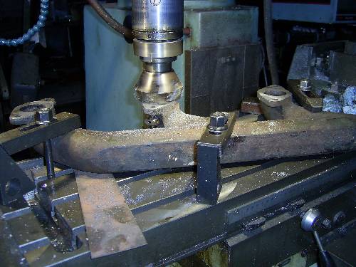 Refacing inlet manifold flanges on a milling machine