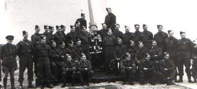 1 - Taken in April 1940 when in 284 HAA Battery RA, TA and shows the entire troop alongside the 3inch gun at Littlehampton, I am standing on left of Barrel.
